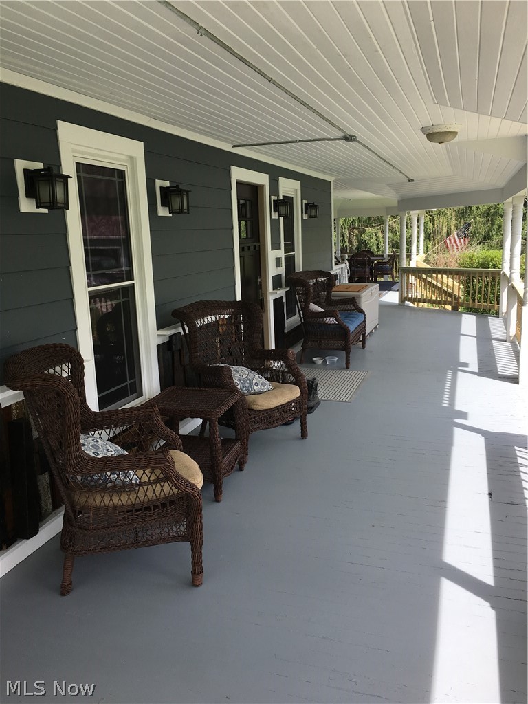 660 Remsen Road Medina, OH 44256 - Photo 2 of 35 Gorgeous wrap around porch! Spindles and railing just replaced.