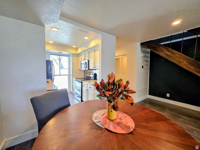 5265 South Rome Beauty Park Murray, UT 84123 - Photo 20 of 35 Dining space featuring dark wood-style flooring and recessed lighting