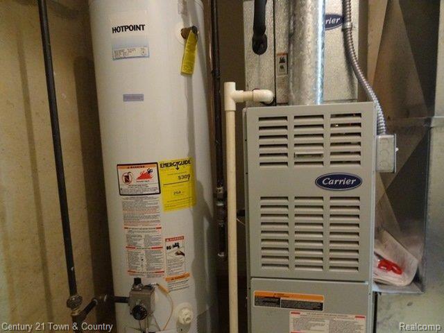 513 Victoria Lane, Unit 29 Romeo, MI 48065 - Photo 13 of 20 NEWER HOT WATER TANK.