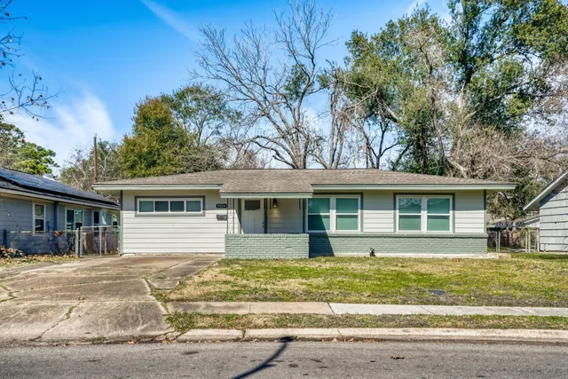 front view of a house with a patio