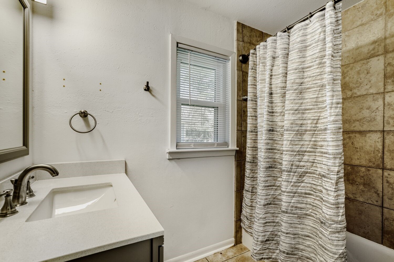5014 Viking Drive Houston, TX 77092 - Photo 24 of 30 a bathroom with a sink a toilet and shower