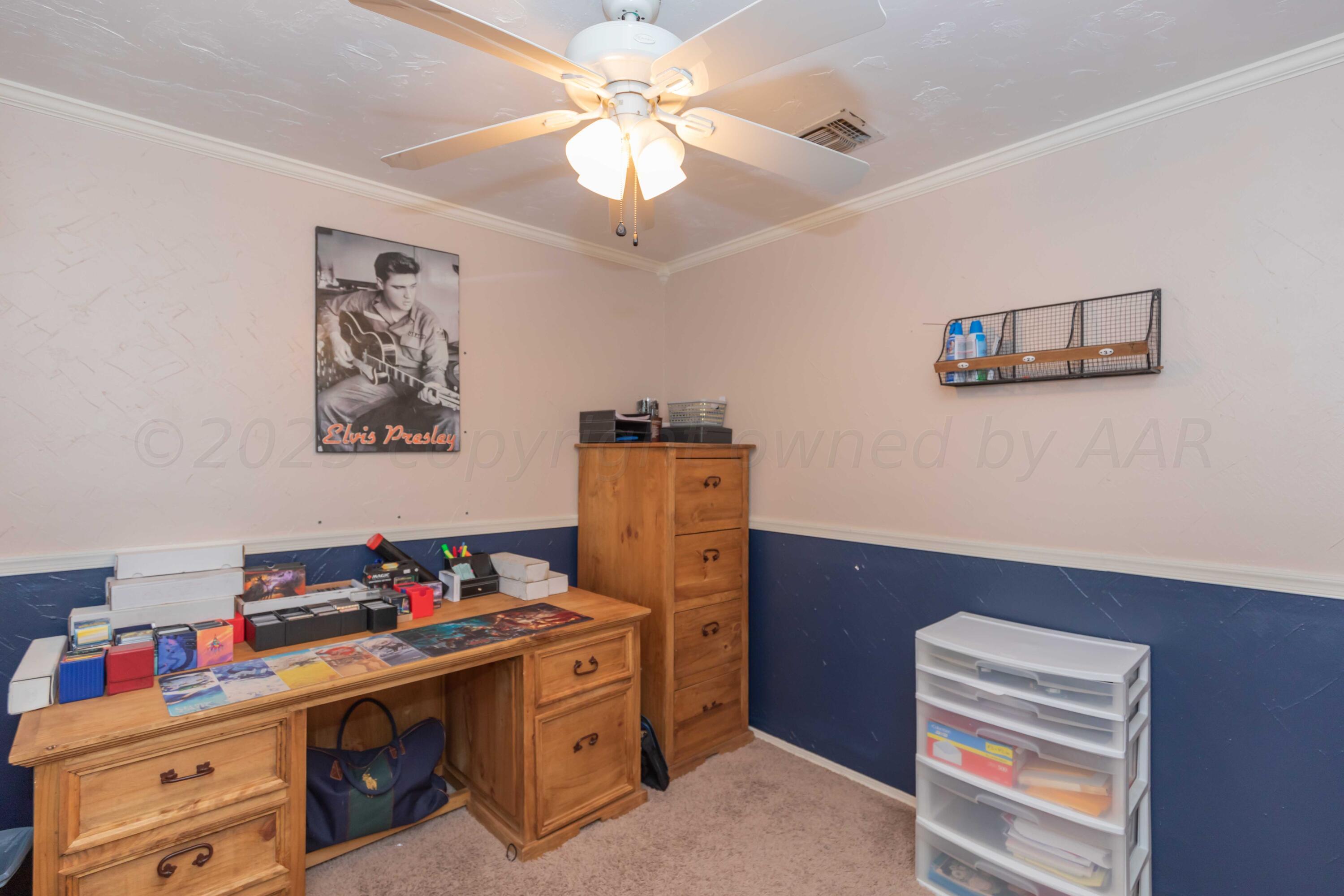 2805 Shield Court Amarillo, TX 79110 - Photo 27 of 36 a room with a workspace
