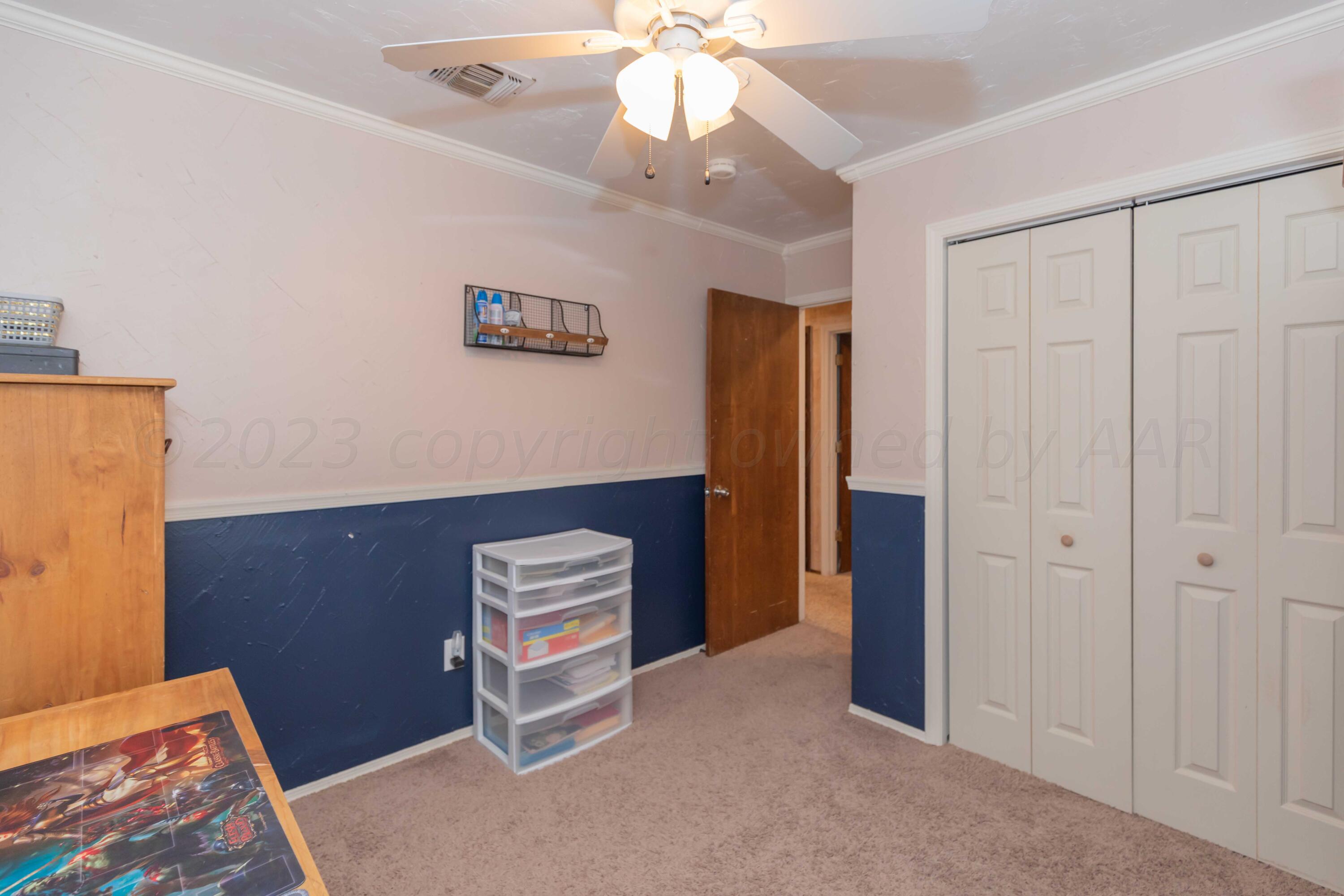 2805 Shield Court Amarillo, TX 79110 - Photo 28 of 36 a view of room with window and ceiling fan
