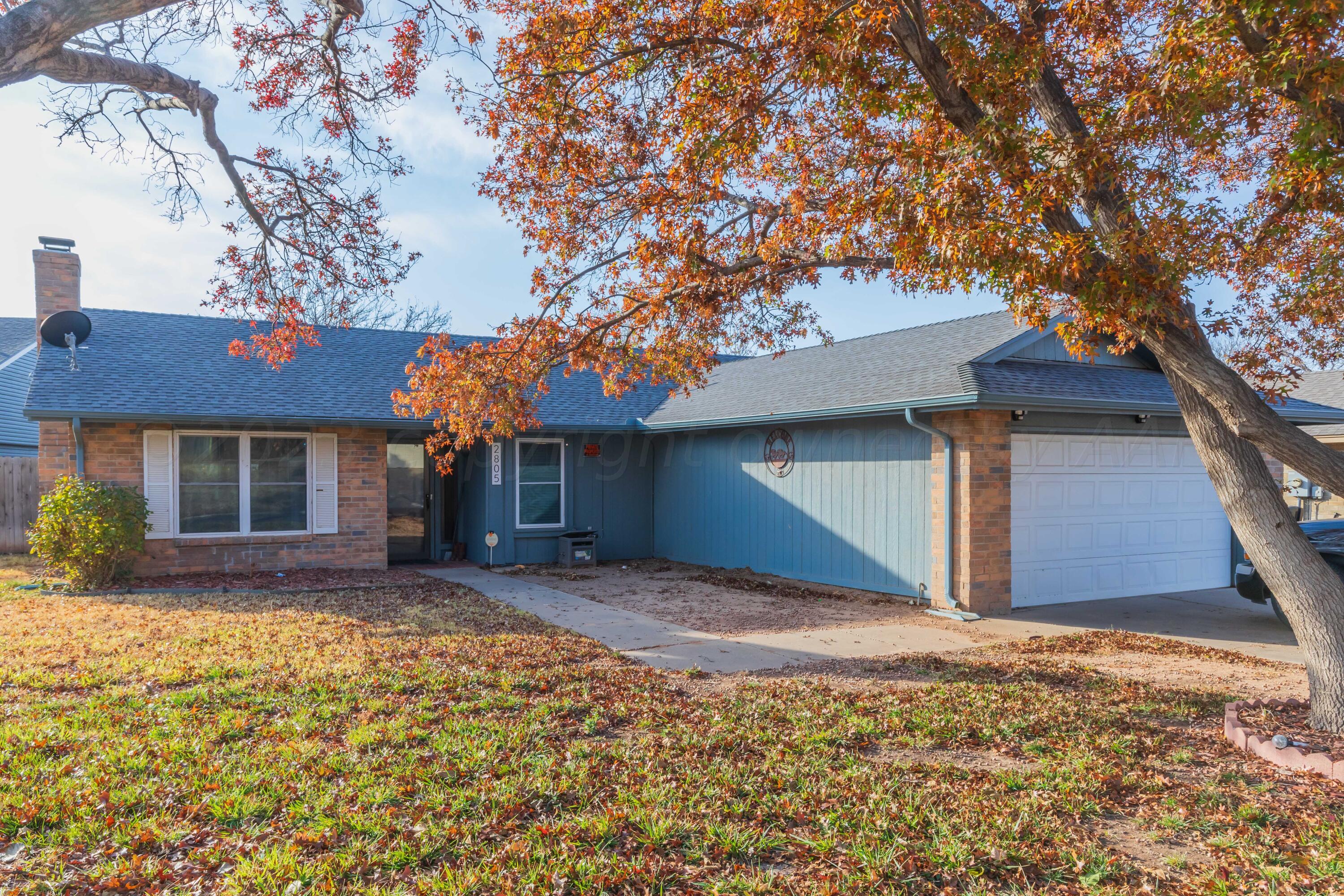 2805 Shield Court Amarillo, TX 79110 - Photo 3 of 36 a view of a house with a tree