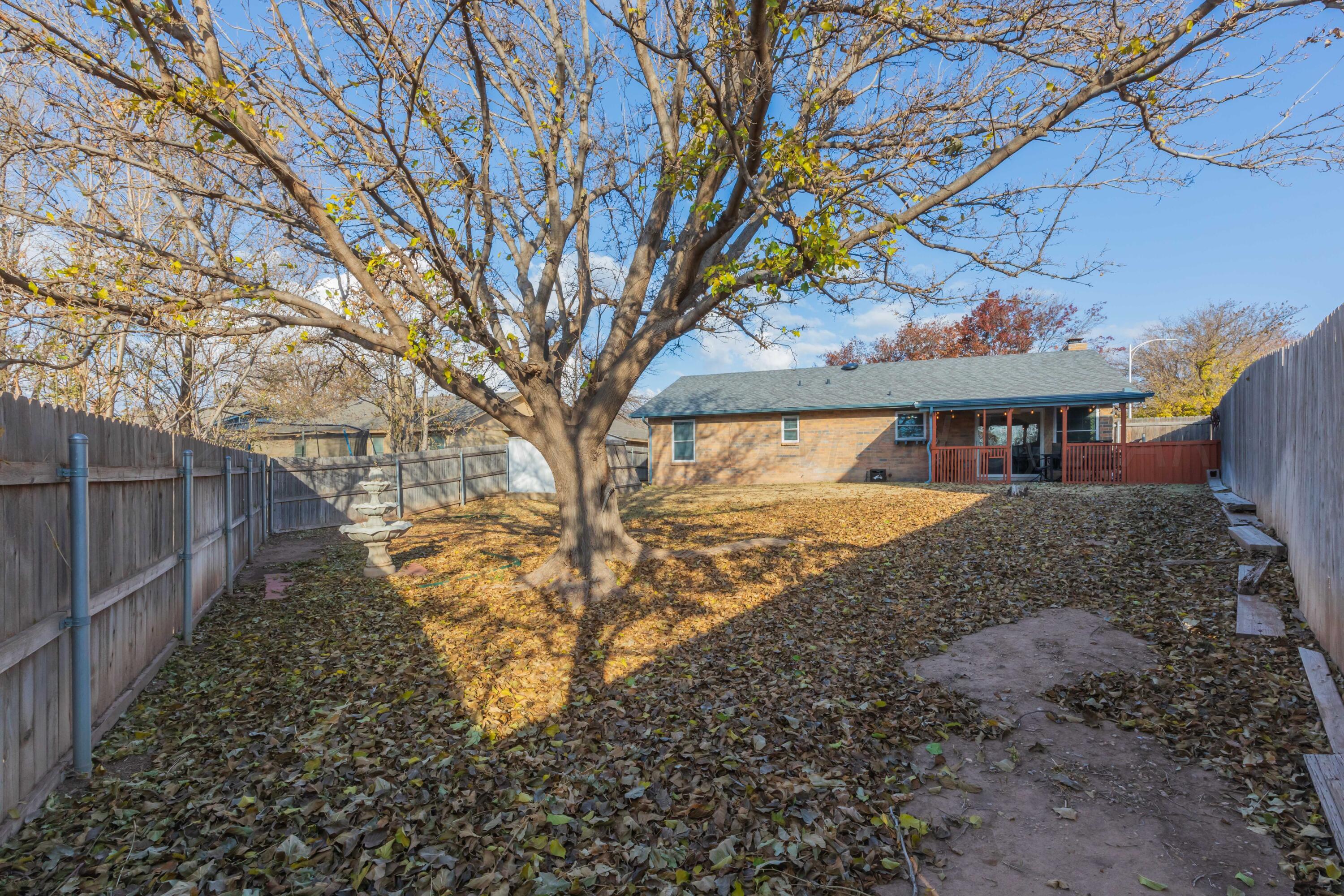 2805 Shield Court Amarillo, TX 79110 - Photo 35 of 36 a view of a house with a yard