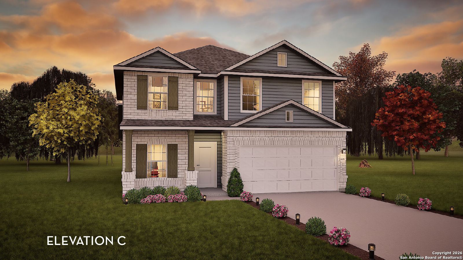 a front view of a house with a garden