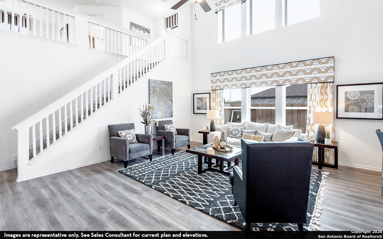 9005 Hazel Birch Elmendorf, TX 78112 - Photo 5 of 21 a view of a dining room with furniture window and wooden floor