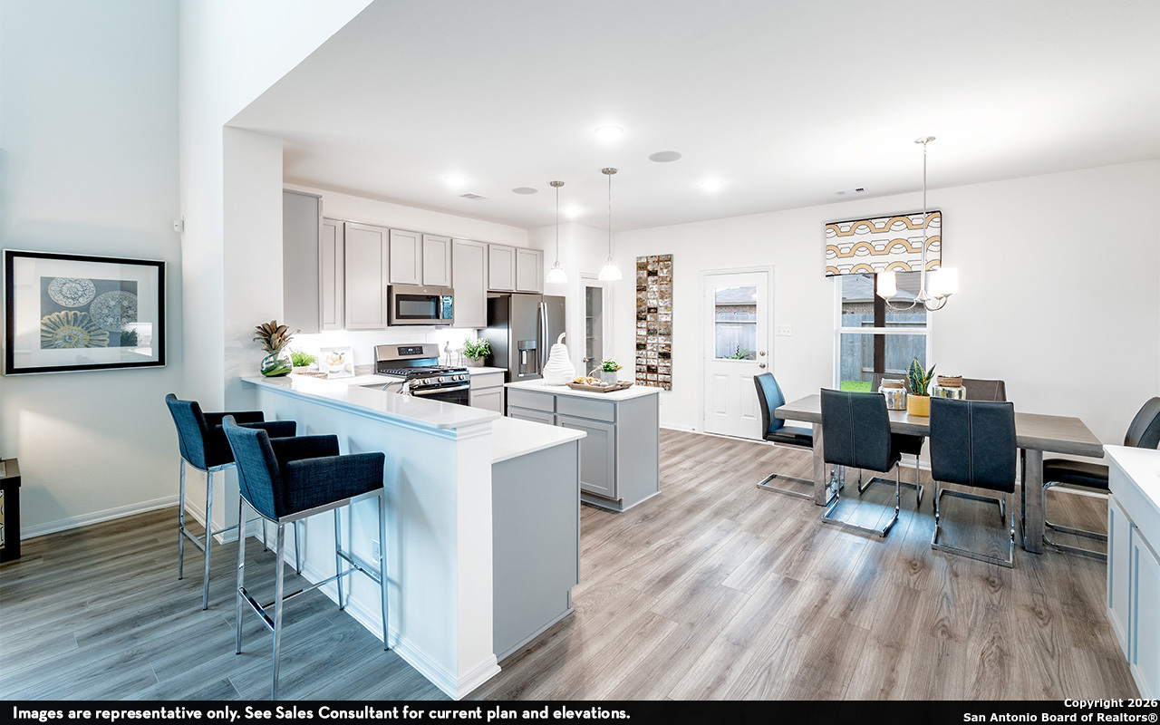 9005 Hazel Birch Elmendorf, TX 78112 - Photo 7 of 21 a living room with furniture and kitchen view