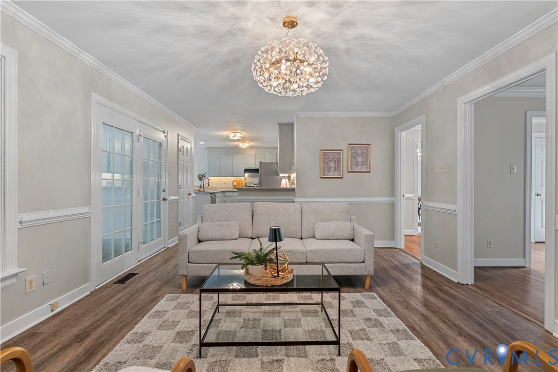 14308 Chimney House Road Midlothian, VA 23112 - Photo 11 of 52 Spacious living area featuring wood-finish floorin