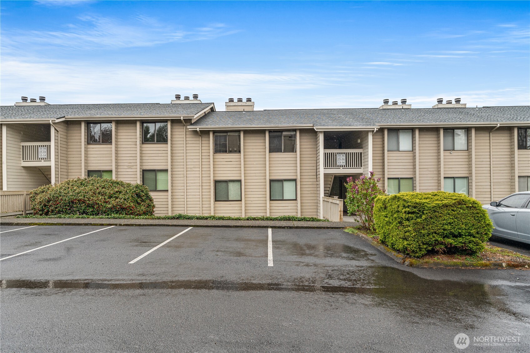 1319 South Puget Drive, Unit D35 Renton, WA 98055 - Photo 23 of 26 front view of a house