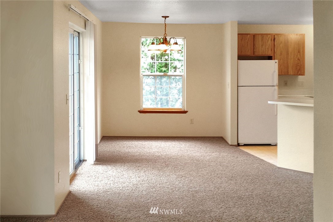 3118 Morrison Road West, Unit AD University Place, WA 98466 - Photo 5 of 11 a view of an empty room with a window