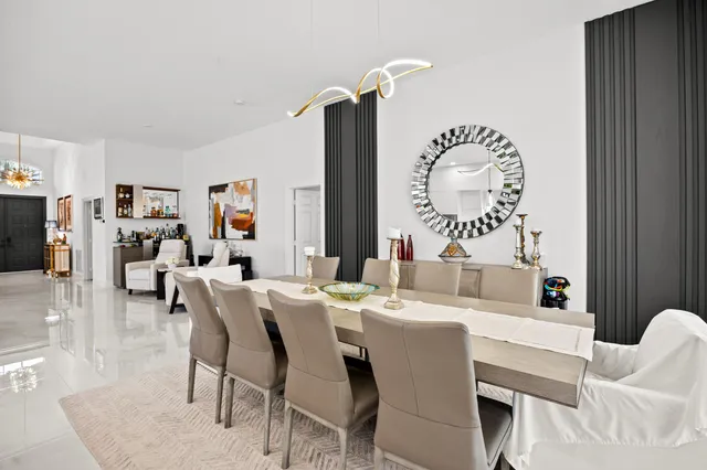 a dining room with furniture and a table