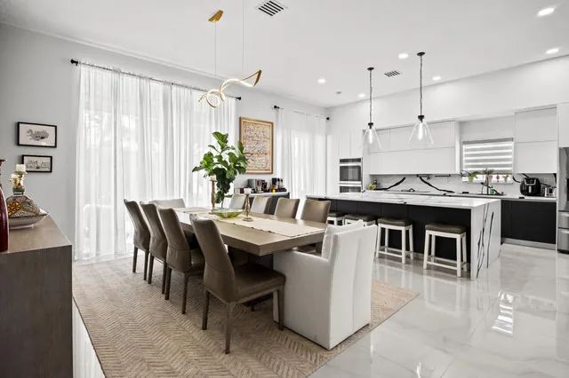 a view of a dining room with furniture