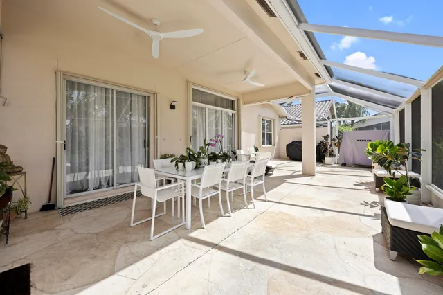 a white table and chairs in a room
