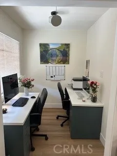 a view of a workspace with furniture