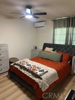 23435 Panama Avenue Carson, CA 90745 - Photo 6 of 22 a bedroom with a bed and a chandelier