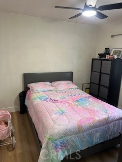 23435 Panama Avenue Carson, CA 90745 - Photo 7 of 22 a bedroom with a bed and wooden floor