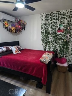 23435 Panama Avenue Carson, CA 90745 - Photo 8 of 22 a bedroom with a bed and a potted plant