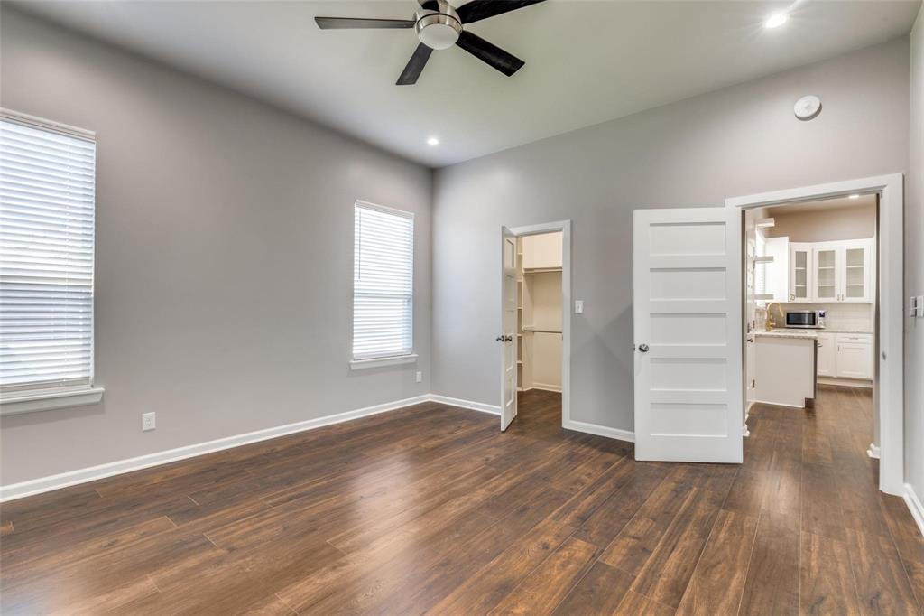 619 Buckalew Street Dallas, TX 75208 - Photo 22 of 29 wooden floor in an empty room with a window