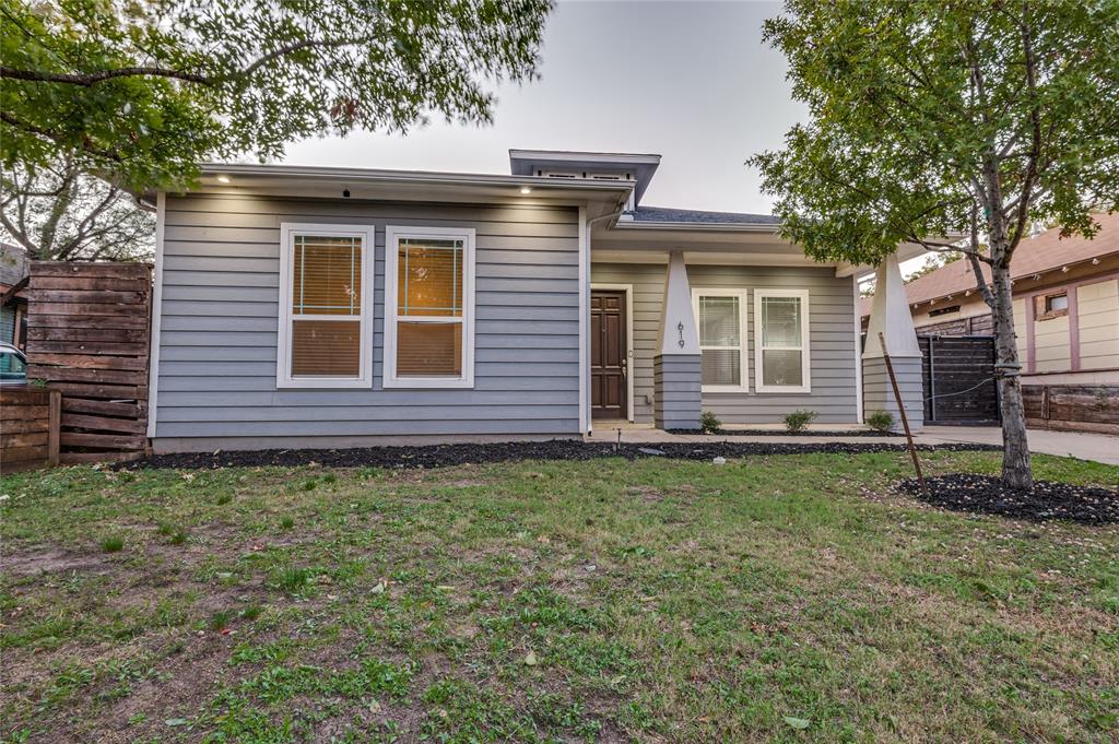 619 Buckalew Street Dallas, TX 75208 - Photo 5 of 29 a view of a house with a yard