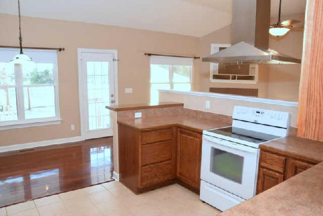 888 Locust Grove Road Watertown, TN 37184 - Photo 11 of 20 The eat-in area overlooks the pool and there is also a bar lip for casual dining. There are high efficiency replacement windows throughout the home.