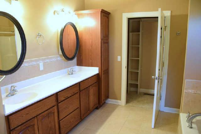 888 Locust Grove Road Watertown, TN 37184 - Photo 8 of 20 With lots of tile and updated fixtures you'll think you're in a brand new home! The master closet offers plenty of space for all your wardrobe.