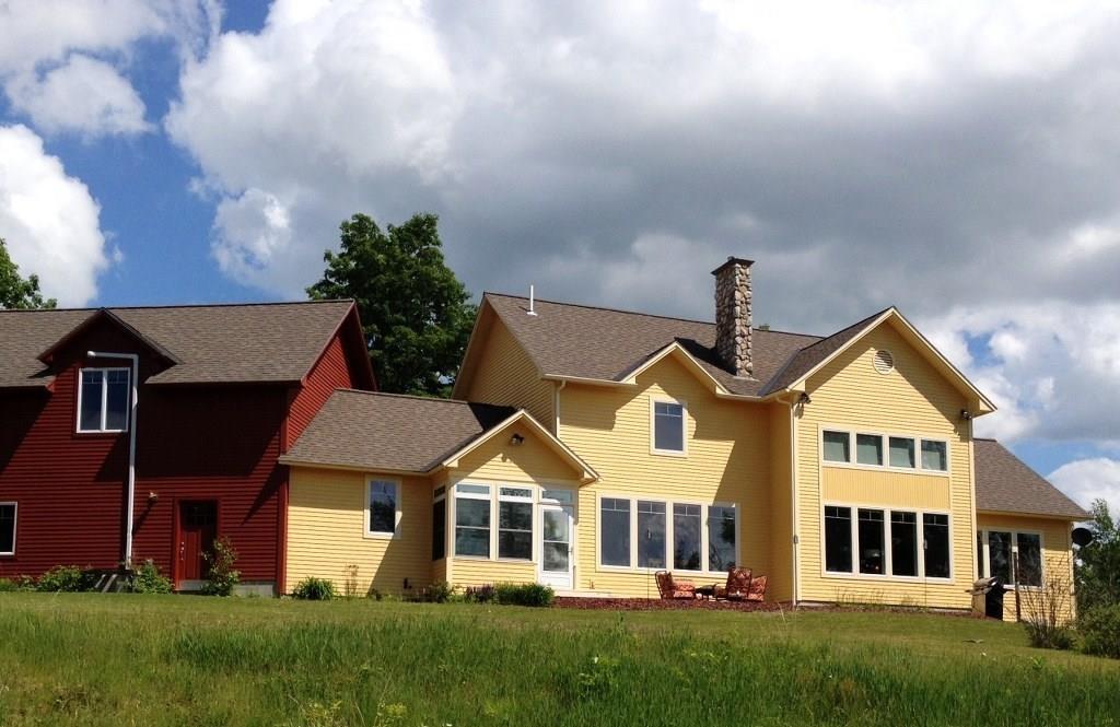 402 Knights Hill Road Harrison, ME 04040 - Photo 2 of 34 Backside of property with gorgeous...