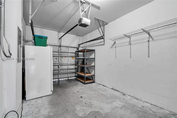 a view of a room with racks on the wall