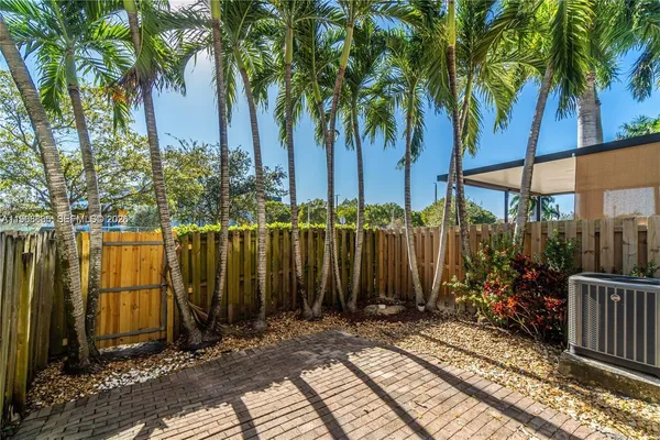 a view of a backyard with a garden