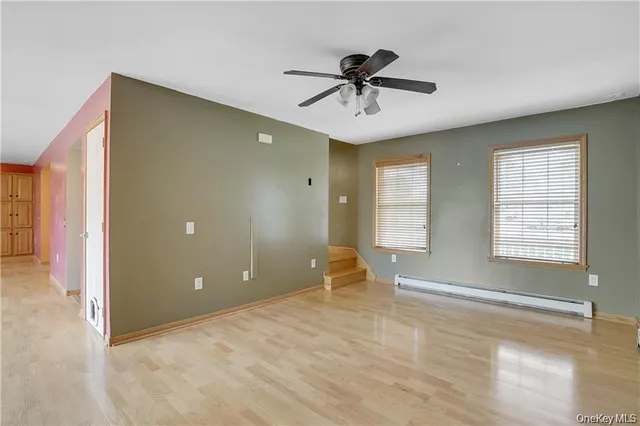 a kitchen with stainless steel appliances granite countertop a stove a refrigerator and a sink