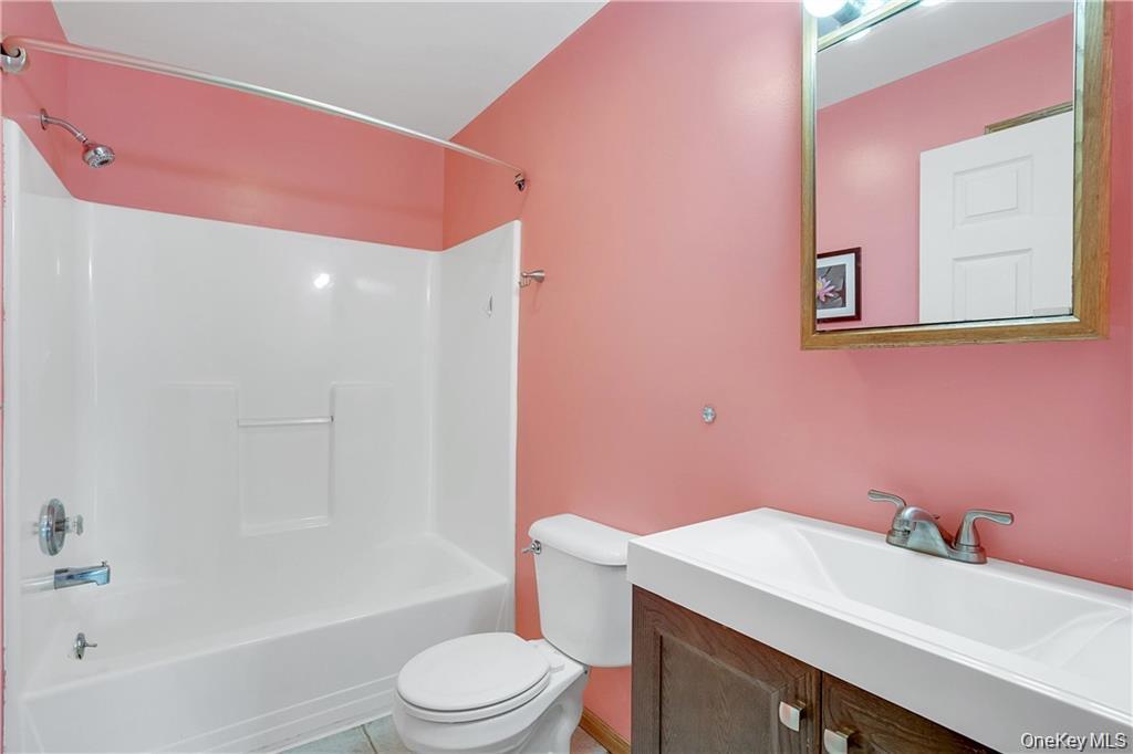 1 Tomkins Avenue Stony Point, NY 10980 - Photo 27 of 35 a bathroom with a sink a toilet and shower