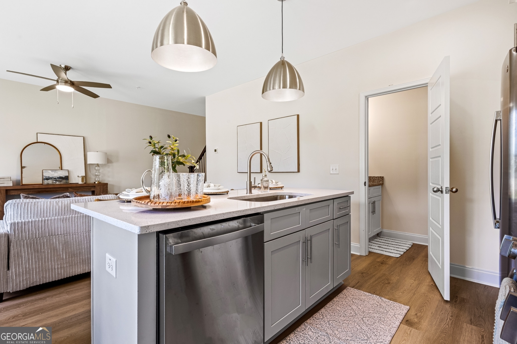 205 Starr Circle Stockbridge, GA 30281 - Photo 11 of 30 a kitchen with a sink and a refrigerator