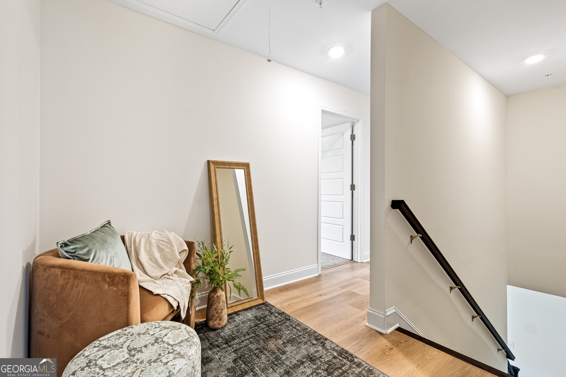 205 Starr Circle Stockbridge, GA 30281 - Photo 14 of 30 a living room with furniture and wooden floor