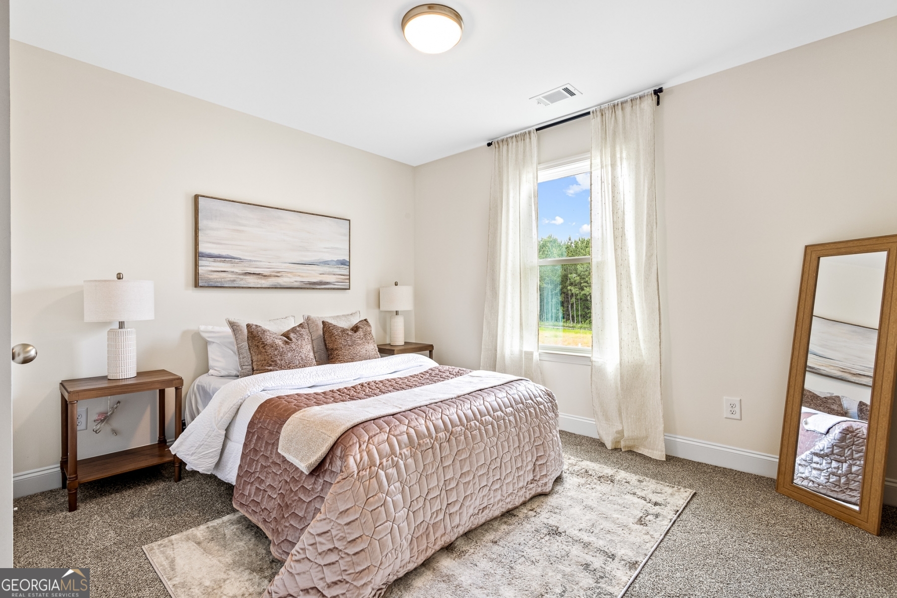 205 Starr Circle Stockbridge, GA 30281 - Photo 15 of 30 a bedroom with a bed and a large window
