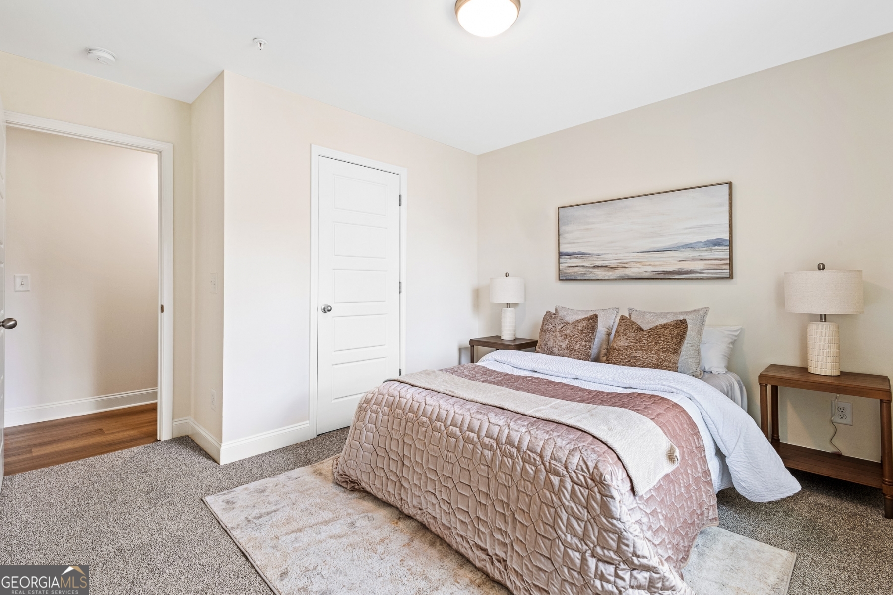 205 Starr Circle Stockbridge, GA 30281 - Photo 16 of 30 a bedroom with a bed and a painting