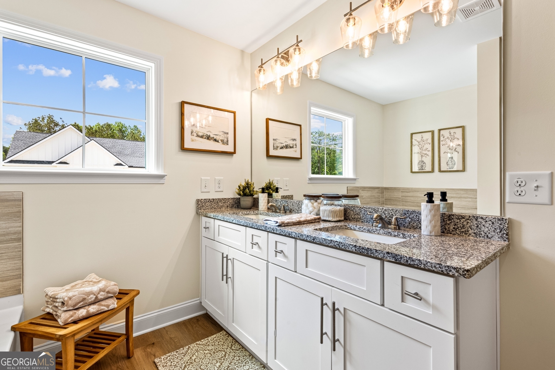 205 Starr Circle Stockbridge, GA 30281 - Photo 26 of 30 a bathroom with a granite countertop sink and a mirror