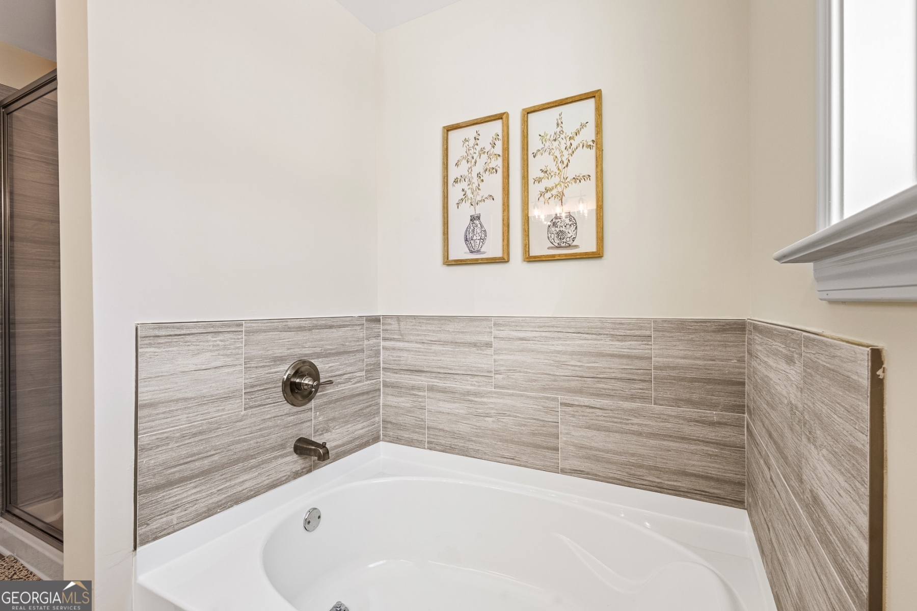 205 Starr Circle Stockbridge, GA 30281 - Photo 27 of 30 a bathroom with a bathtub and shower