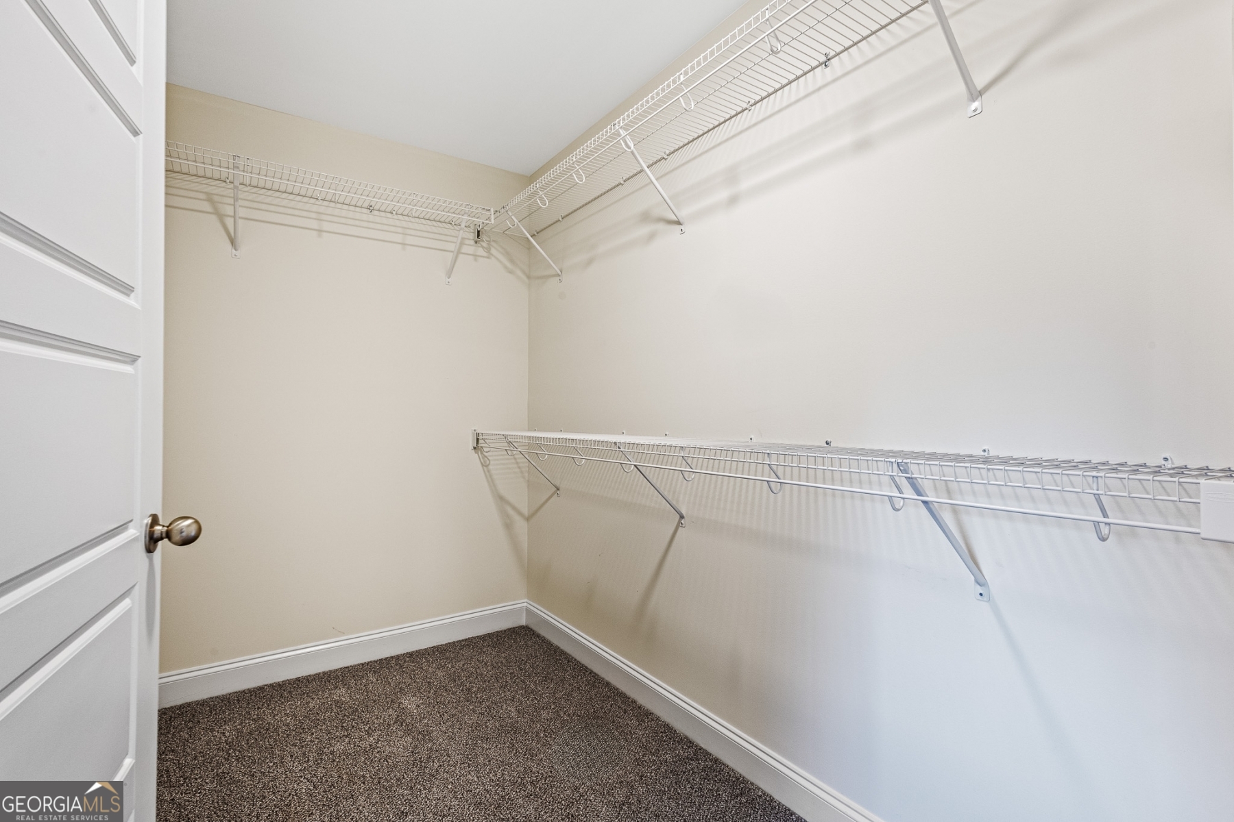 205 Starr Circle Stockbridge, GA 30281 - Photo 29 of 30 a view of a room with racks on the wall