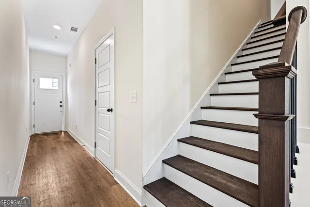 a view of entryway with wooden floor
