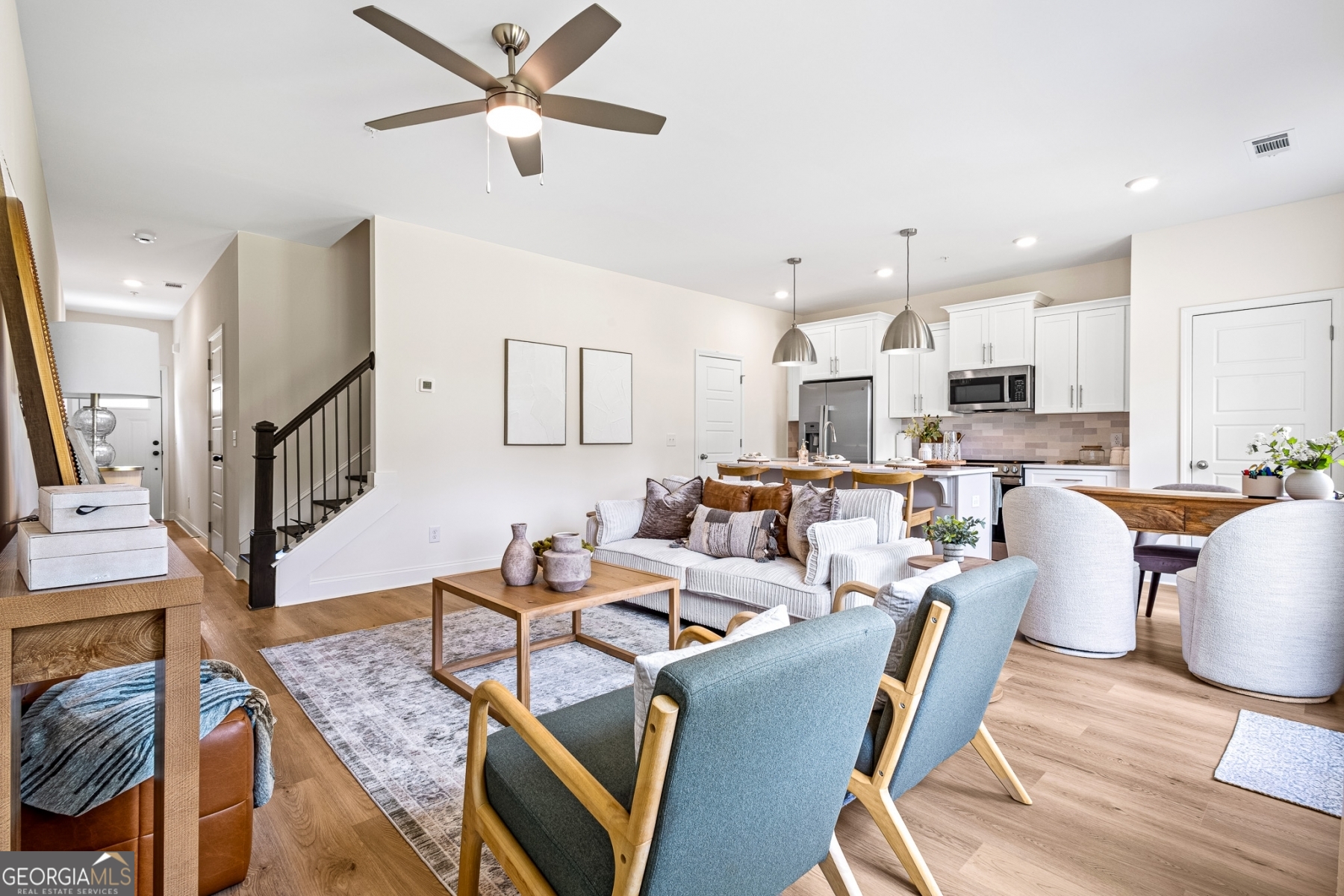 205 Starr Circle Stockbridge, GA 30281 - Photo 6 of 30 a living room with lots of furniture and kitchen view