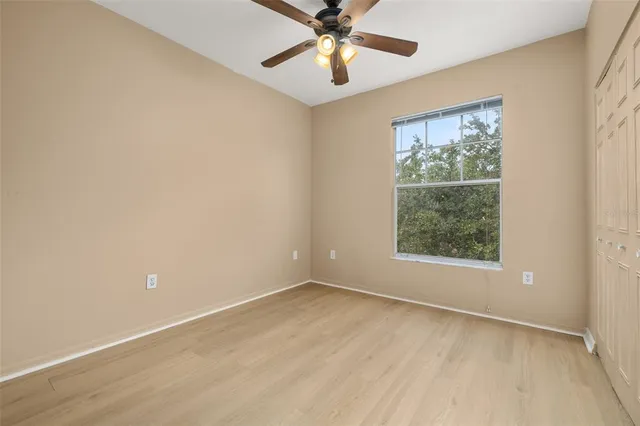 a view of a glass door and the balcony
