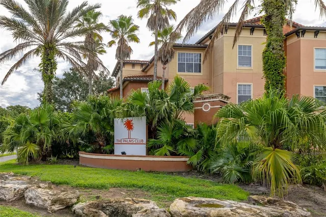 a front view of a house with a yard and porch