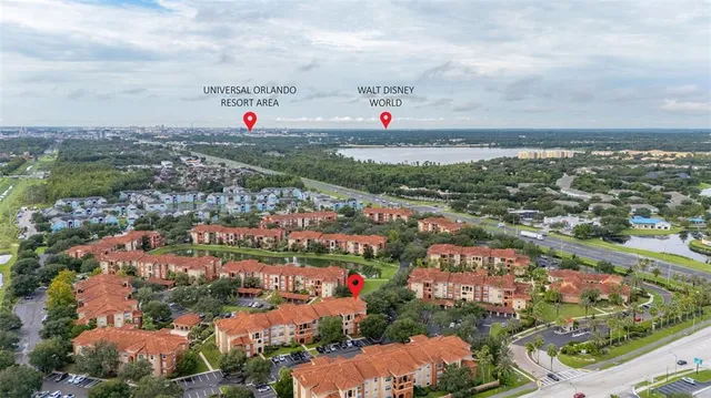 an aerial view of city and green space