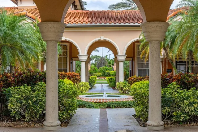 a view of a swimming pool with a lounge chair