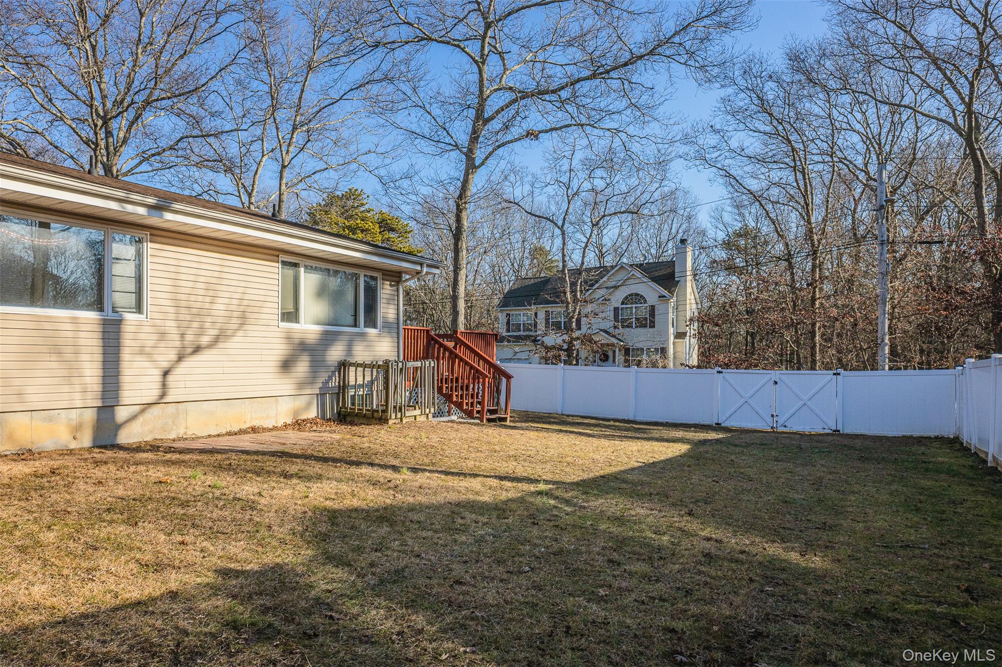 2 Fenwick Street Mastic, NY 11950 - Photo 23 of 27 a view of outdoor space yard and swimming pool