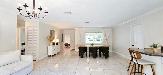 a view of a livingroom with furniture and window