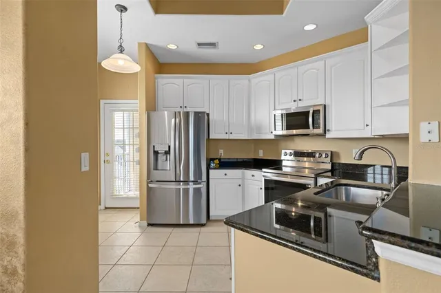 $315,000 | 13436 Fountainbleau Drive, Unit 25, Clermont, FL 34711