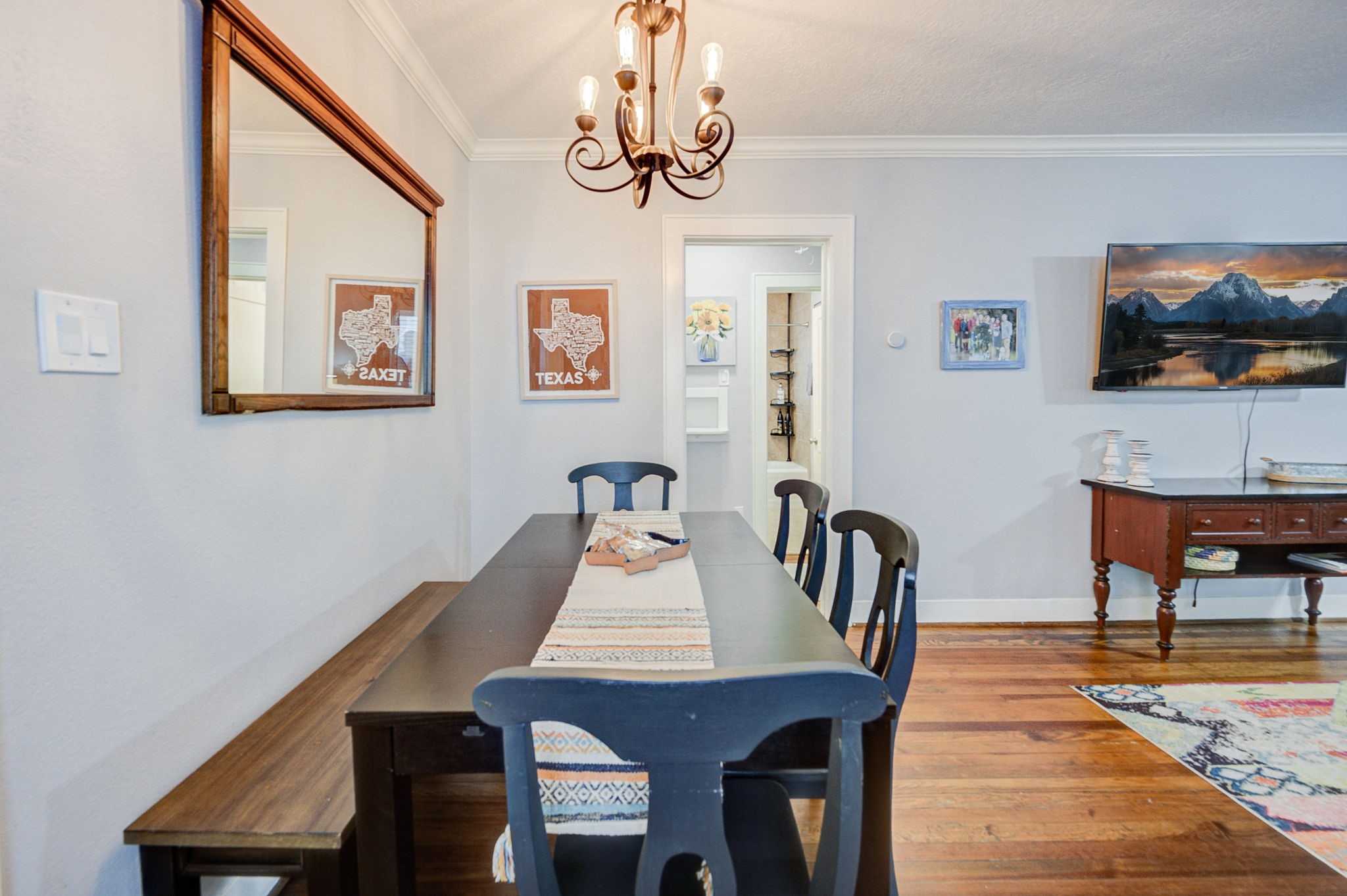 408 Tabor Street Houston, TX 77009 - Photo 13 of 35 a view of a dining room with furniture and wooden floor