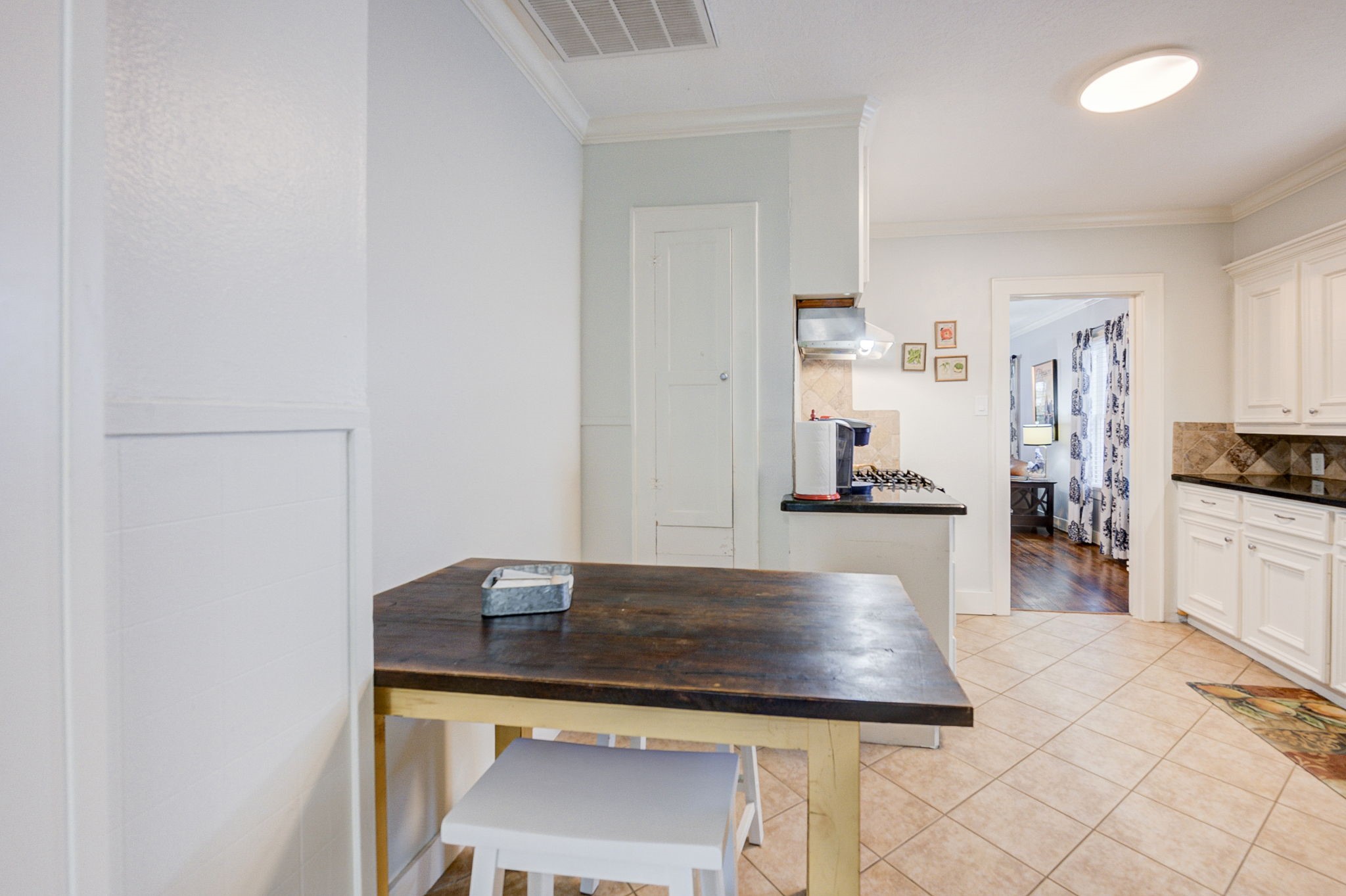 408 Tabor Street Houston, TX 77009 - Photo 19 of 35 a kitchen with kitchen island a counter top space and cabinets