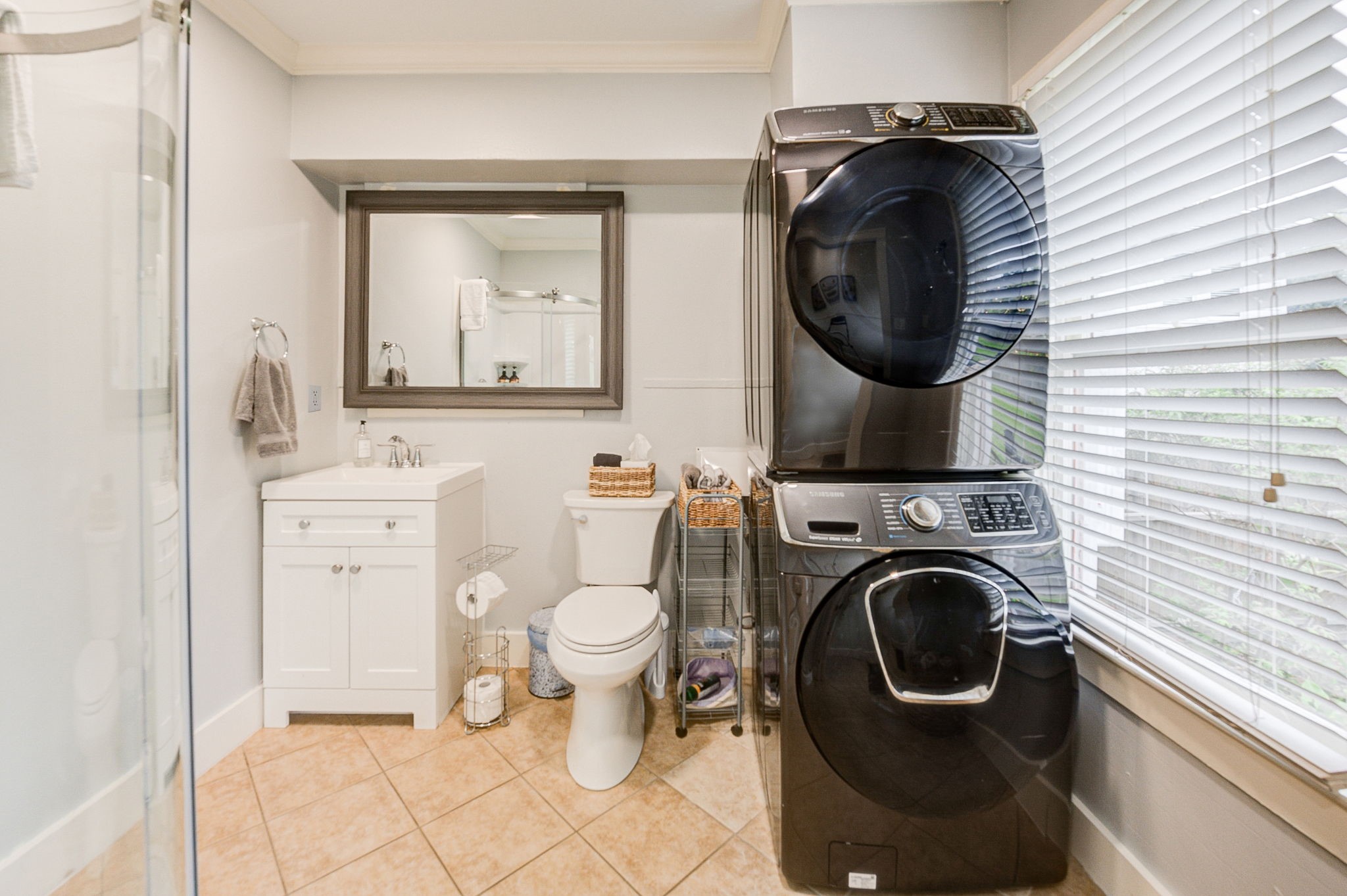 408 Tabor Street Houston, TX 77009 - Photo 23 of 35 a bathroom with a toilet mirror and sink
